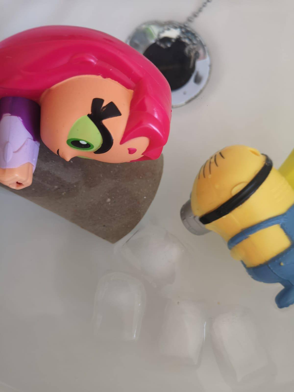 Toys in bath of ice