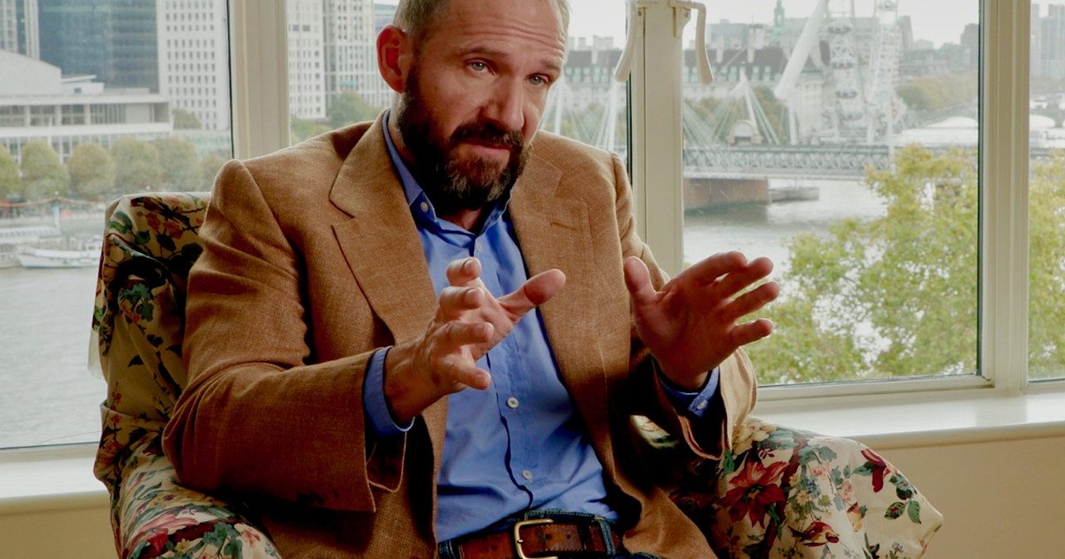 Ralph Fiennes speaking to camera