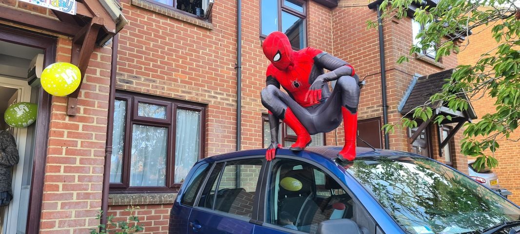 Hastings Spidey on top of car