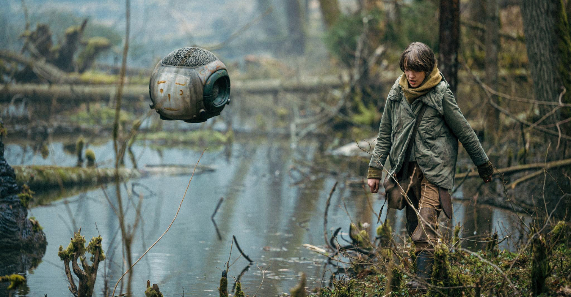 Girl and floating metal robot in woods