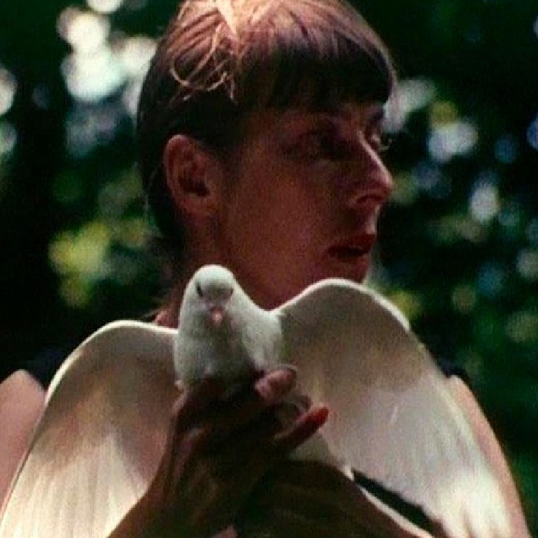 Woman holding dove