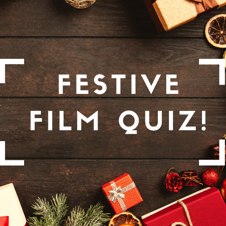 Festive Film Quiz poster of christmas trinkets on a table