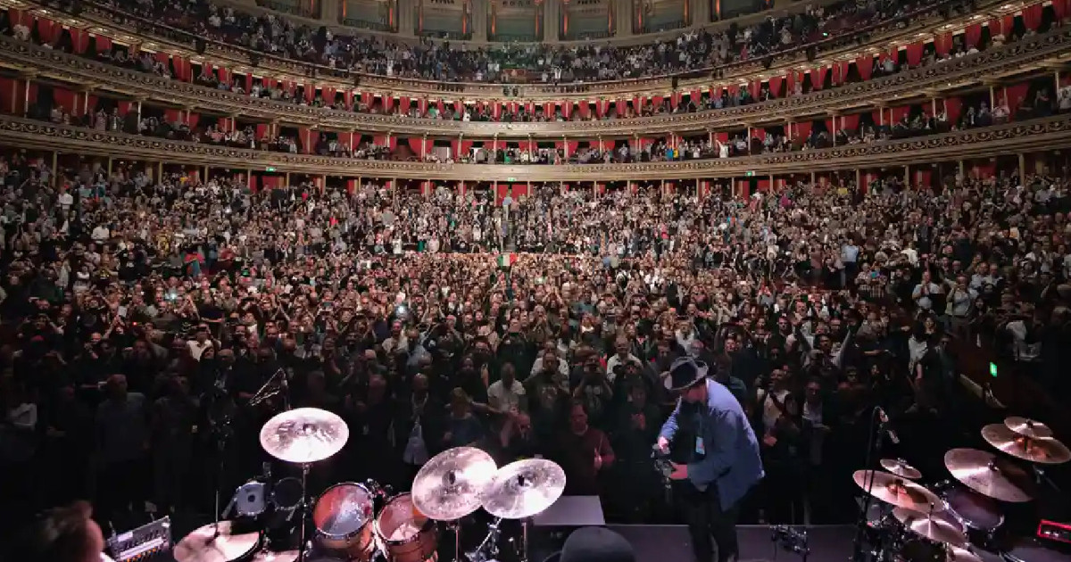 King Crimson band onstage showing large crowd 