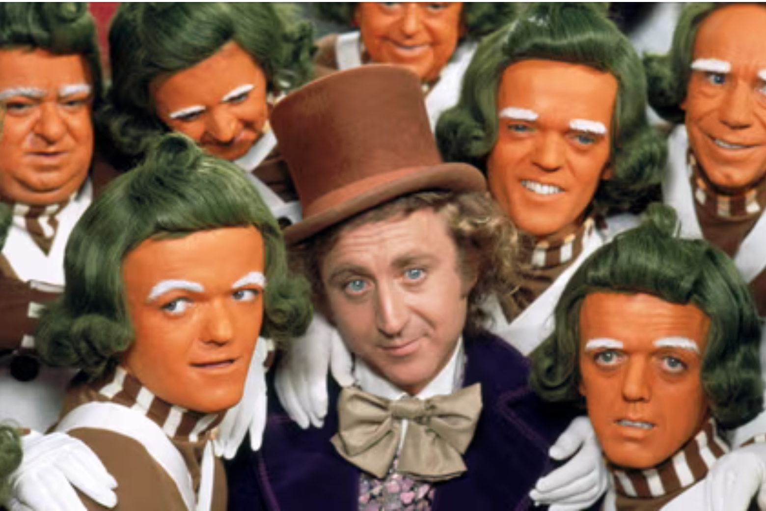 willy wonka plus a few orange oompa loompas